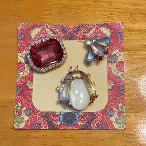 Anthropologie set of 3 pins. New in package